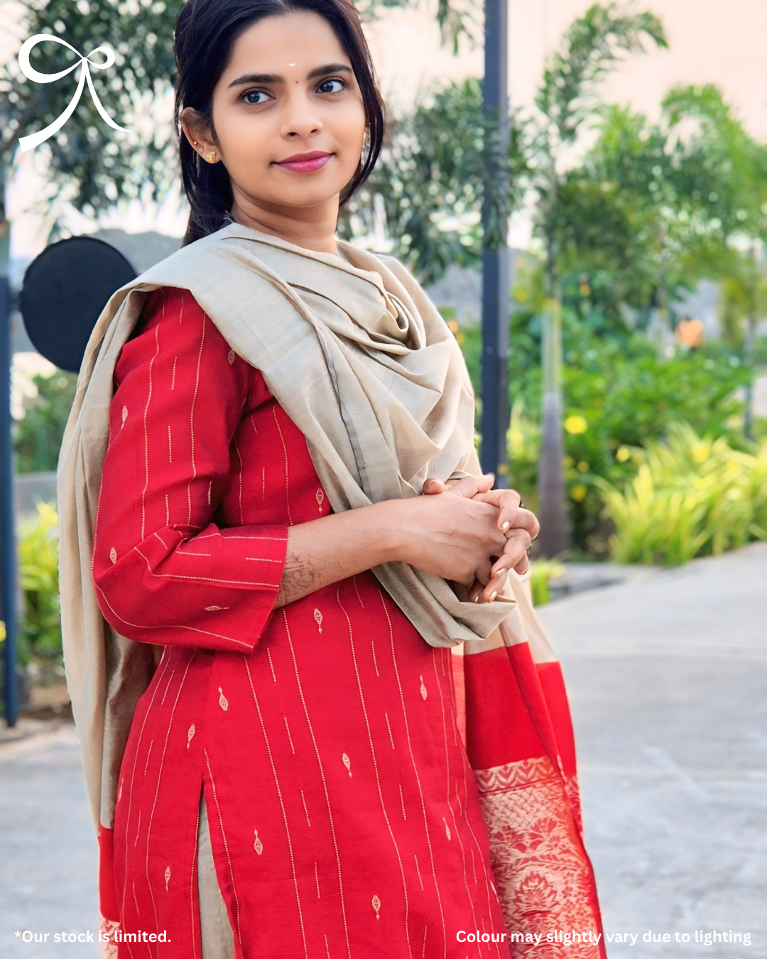 Festive red raw silk salwar suit set with zari weave and copper dupatta styled for traditional celebrations. Page maintained by Creations by Nash.